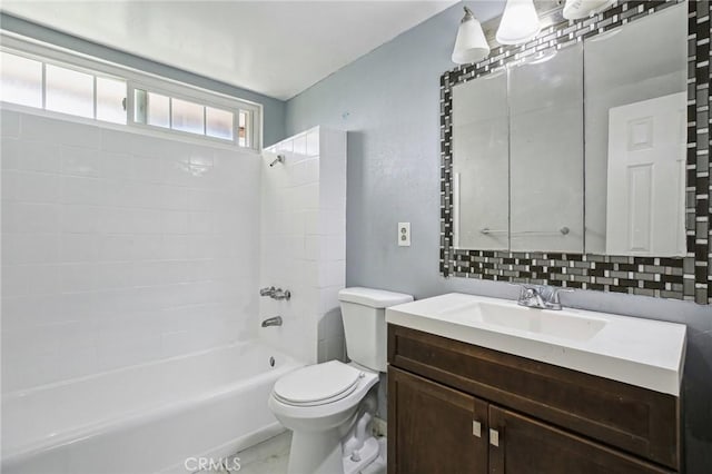 full bathroom with tub / shower combination, vanity, and toilet