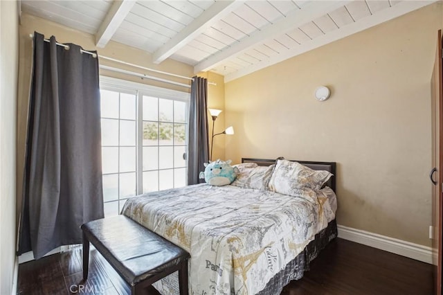 bedroom featuring wooden ceiling, dark wood finished floors, lofted ceiling with beams, and baseboards