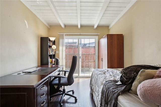 bedroom with access to exterior, beamed ceiling, and wood finished floors