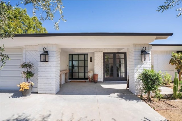 5910 Pat Ave, Woodland Hills, CA 91367 - property entrance featuring brick siding and french doors