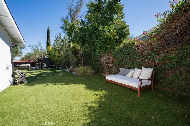 view of yard with fence