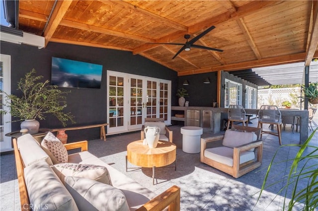 view of patio / terrace featuring french doors, outdoor lounge area, and a ceiling fan