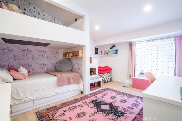 bedroom featuring light wood-style floors and recessed lighting