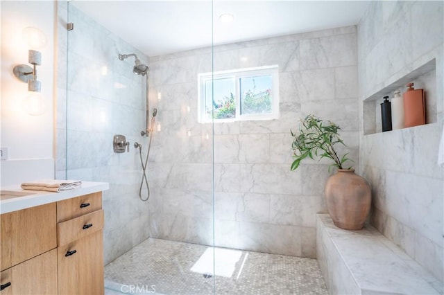 bathroom with vanity and walk in shower