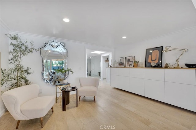 5910 Pat Ave, Woodland Hills, CA 91367 - sitting room with light wood-style flooring, crown molding, and recessed lighting