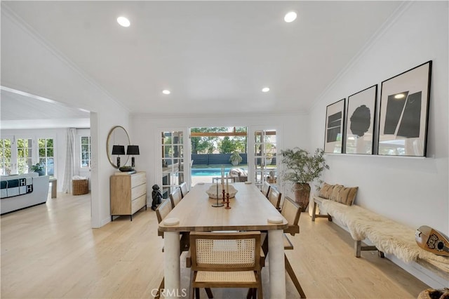 5910 Pat Ave, Woodland Hills, CA 91367 - dining space featuring french doors, light wood-style floors, ornamental molding, and recessed lighting