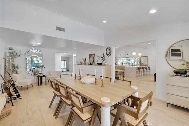 5910 Pat Ave, Woodland Hills, CA 91367 - dining space featuring ornamental molding, light wood finished floors, and recessed lighting