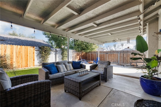 view of patio with a fenced backyard and an outdoor living space