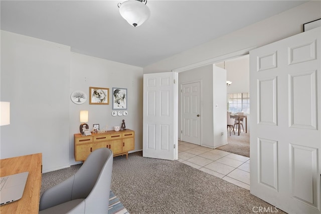 office area featuring light carpet and light tile patterned flooring