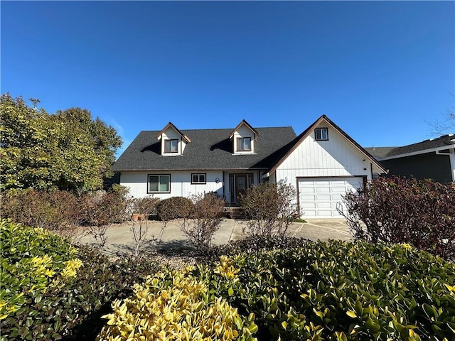 view of front of home with a garage and driveway