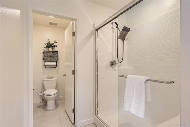 35107 Rangpur Ln, Fallbrook, CA 92028 - bathroom with a stall shower, toilet, tile patterned flooring, and baseboards