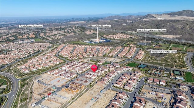 bird's eye view with a mountain view