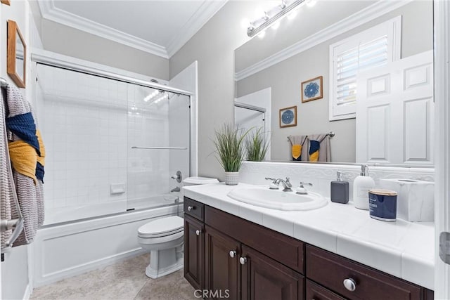 full bathroom with toilet, enclosed tub / shower combo, ornamental molding, tile patterned floors, and vanity