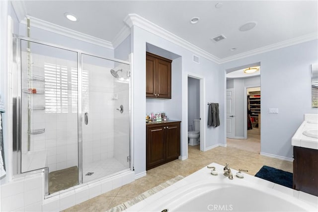 bathroom featuring a stall shower, visible vents, and ornamental molding