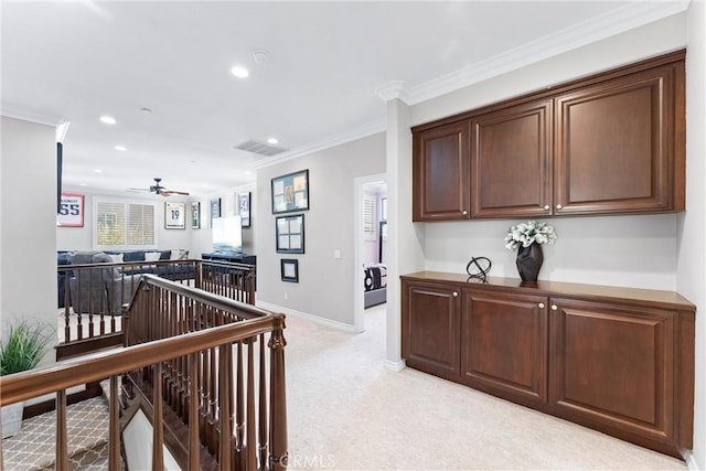 corridor with crown molding, recessed lighting, light carpet, an upstairs landing, and baseboards