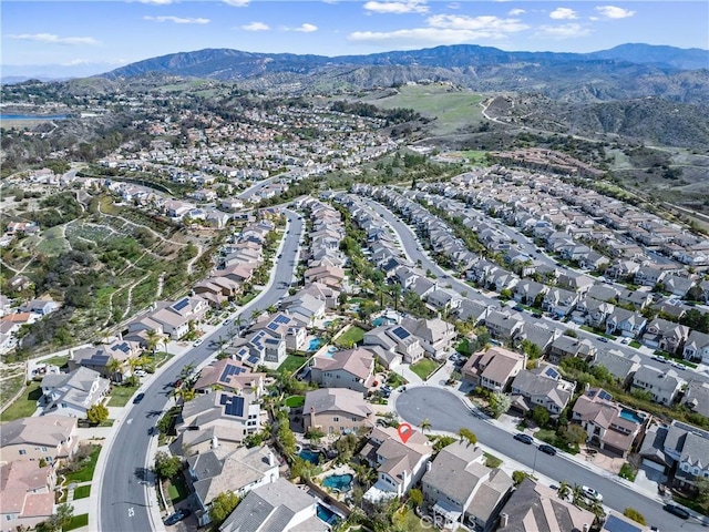 aerial view featuring a residential view and a mountain view