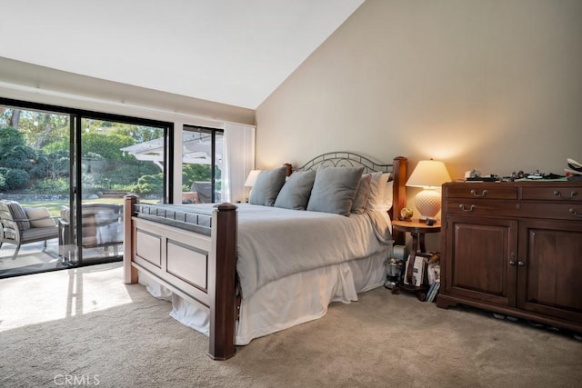 bedroom with high vaulted ceiling, access to outside, and light colored carpet