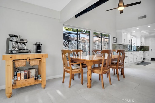 dining room featuring ceiling fan, high vaulted ceiling, recessed lighting, visible vents, and baseboards