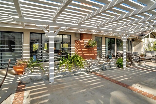 view of patio with a pergola