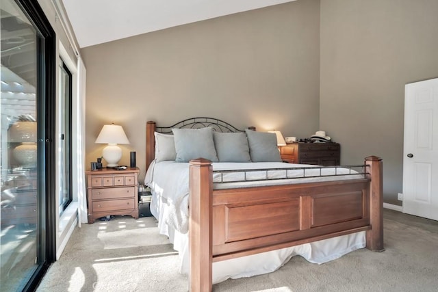 bedroom featuring light colored carpet