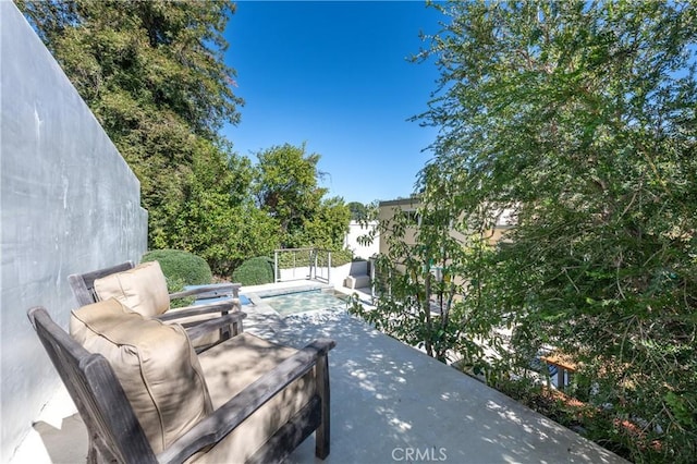 view of patio featuring an outdoor pool