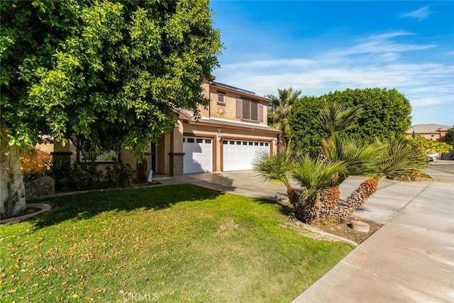 view of property hidden behind natural elements with an attached garage, driveway, a front yard, and stucco siding