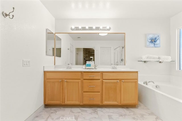 bathroom featuring double vanity, marble finish floor, a shower stall, and a bath