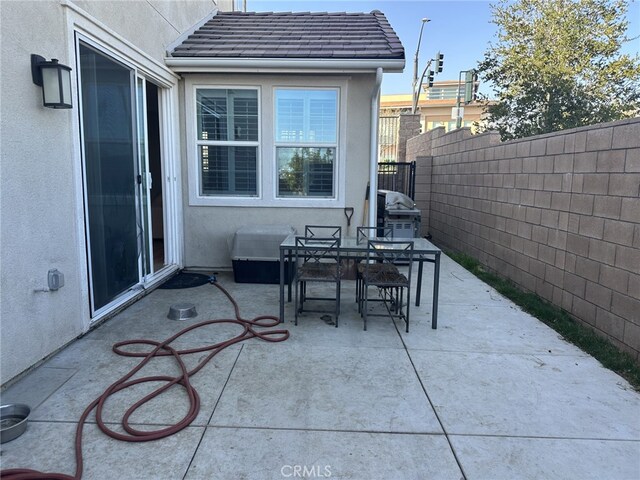 13906 Gazania Ln, Fontana, CA 92336 - view of patio / terrace featuring outdoor dining area