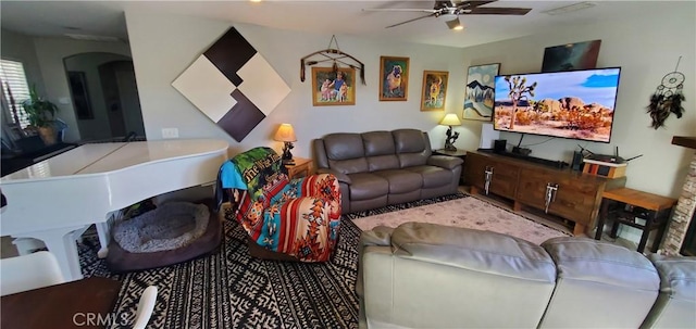 living area featuring ceiling fan