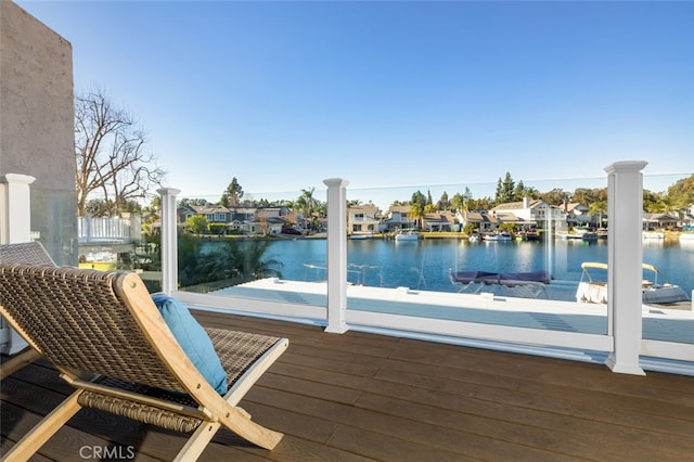 dock area with a water view