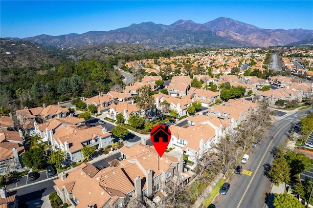 bird's eye view featuring a mountain view and a residential view