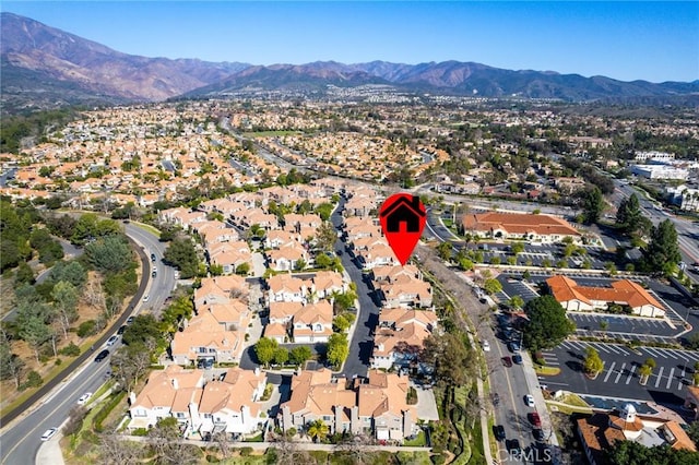 aerial view featuring a residential view and a mountain view