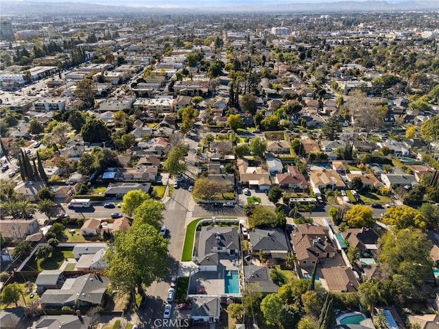 birds eye view of property with a residential view