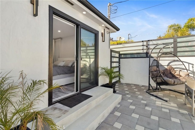 view of patio with a balcony