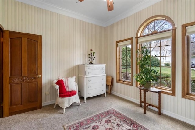 living area with carpet, baseboards, and wallpapered walls