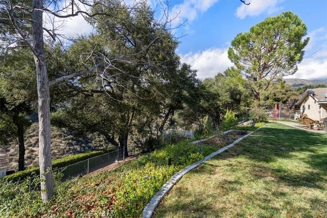 view of yard with fence