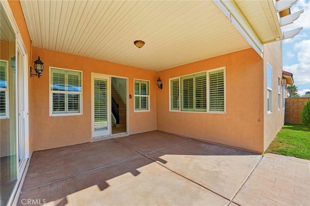 view of patio with fence