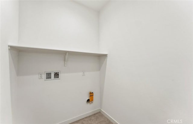 washroom featuring laundry area, hookup for a washing machine, and baseboards