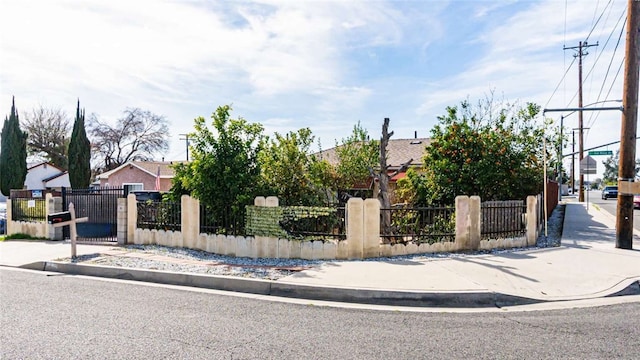 view of front of home featuring a fenced front yard and a gate