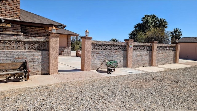 view of yard featuring a patio area and fence