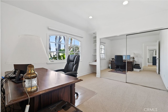 office with recessed lighting, baseboards, and light colored carpet