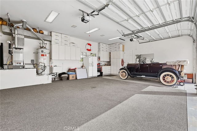 garage featuring white fridge with ice dispenser, secured water heater, and a garage door opener