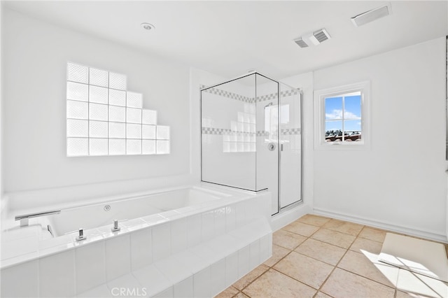 full bath with a stall shower, tile patterned floors, visible vents, and a bath