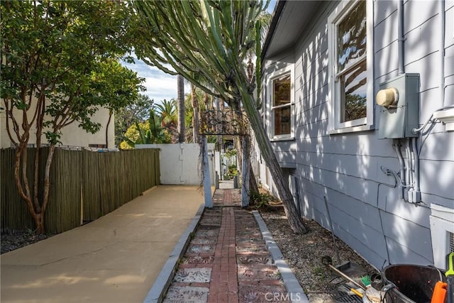 view of property exterior with fence