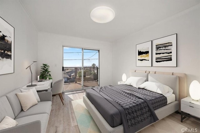 bedroom featuring light wood-style floors and access to exterior