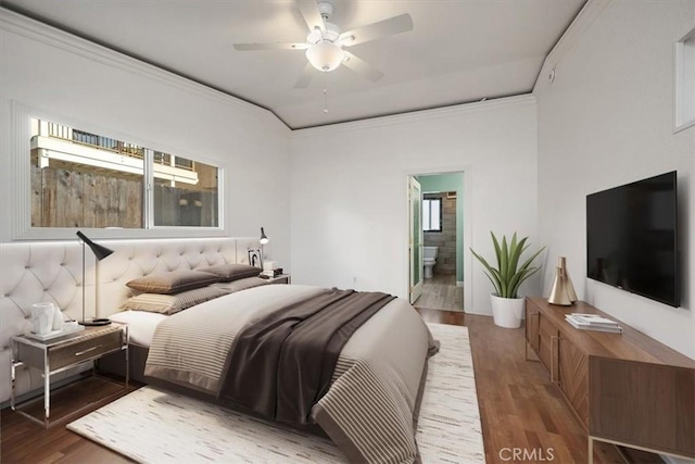 bedroom with crown molding, connected bathroom, a ceiling fan, and wood finished floors