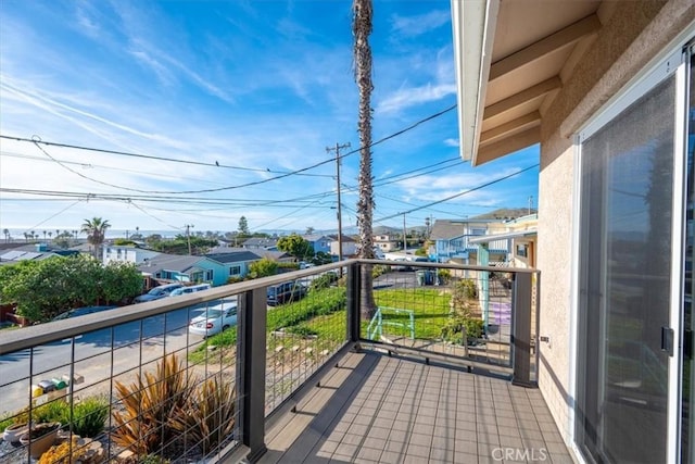 balcony featuring a residential view