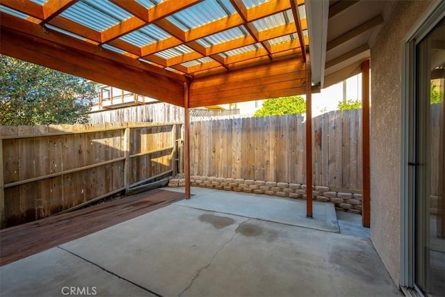 view of patio / terrace featuring fence