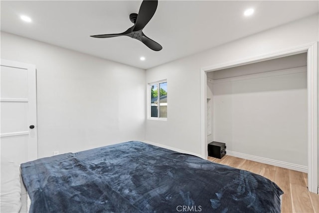 bedroom featuring recessed lighting, ceiling fan, baseboards, and wood finished floors