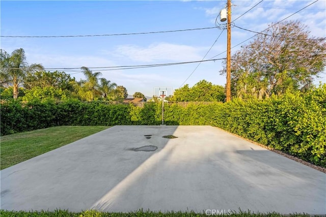 exterior space with basketball hoop